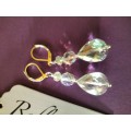 Sterling Silver huggies with large crystal drop. E69