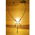brass & crystal necklace. P62