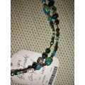 Lovely long beaded necklace, blues and greens. LN11