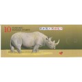 RSA 1997 RHINO BOOKLET WITH WATTLED CRANE STAMPS ATTACHED LEFT 3/4 USED (CTO) PRETORIA