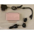 pink Nintendo DS Lite, with car and wall chargers
