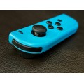 neon blue Left Joy-Con controller for Nintendo Switch with strap