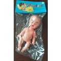New old stock - little doll (unopened)