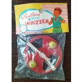 New old stock - unopened plastic whistling whizzer