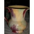 H and K TUNSTALL JUG. SIZE 17CM