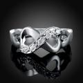 New 925 Sterling Silver filled Infinity style ring adorned with genuine AAA crystals
