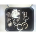 Tin with assorted Jewelry Items