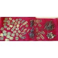 Large assortment of Brass Backing plates,  pins etc WW2 and later
