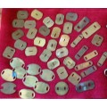 Large assortment of Brass Backing plates,  pins etc WW2 and later