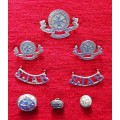 Complete set of St. Johns Ambulance insignia with three different sizes of buttons.