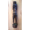 African carving of  man carrying seeds on his shoulder (Superior quality) Vintage