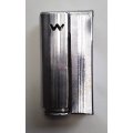 Vintage fluid and flint lighter "W" with removable fuel tank.