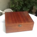 A Small Brown Wooden Box.