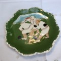 A Porcelain  Plate with a Beryl Cook Transfer.