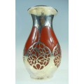 A beautiful small silver overlay vase by Thomas Bavaria