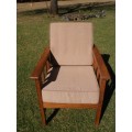 A nice solid Morris chair with cushions, (one of three available)