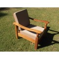 A stylish solid Morris chair with cushions, (one of three available)