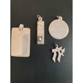 4 silver pendants sold as a job lot