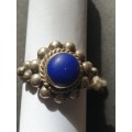 silver ring with a blue stones stamp 925