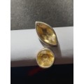 silver ring with a yellow stones stamp 925
