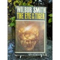 SMITH, Wilbur - The Eye of the Tiger - (First Edition Hardcover in Wrapper)