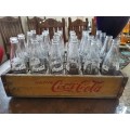 Beautiful Coca Cola Crate with 24 Glass Bottles.