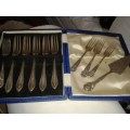 Selection of 9 EPNS cake forks and one small cake lifter