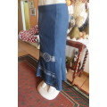 Top of the line ankle length trumpet style cotton stretch denim skirt in size 36/12.