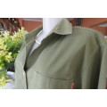 Army green ladies long sleeve casual shirt by 'News' in size 40/16. Two front pockets.