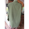Army green ladies long sleeve casual shirt by 'News' in size 40/16. Two front pockets.