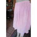 Cute carnation pink crinkled knee length skirt. Size 34/10. Smocked yoke. Elasticated waist.As new