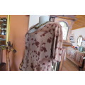 Button down dress in light brown with darker patches and dark brown flowers. Size 44/20.