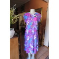 Fabulous blue/pink blouson vintage dress  by TONINI size 36/12Two straps at side to tie. As new