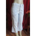 Casual cropped pants in light blue by `Woolworths` in size 32/8. Cargo front pockets.