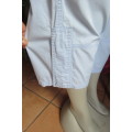 Casual cropped pants in light blue by `Woolworths` in size 32/8. Cargo front pockets.