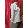 Smart cream top by `Jet-7` Paris. Tailored with 1 pocket on front size 34/10. Elbow length sleeves