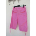 Rosepink pants for girl of 11 to 12 years old. Cargo pockets on front. Dummies at back.