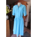 Beautiful cool vintage dress from the 90's in size 40/16 by 'Woolworths'. In 100% polyester.