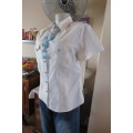 Casual short sleeve top in baby blue,and beige vertical stripes. By BE YOURSELF in size 36/12