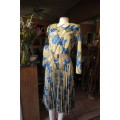 Stunning silky polyester dress with flare consentina pleated bottom size 40/16.