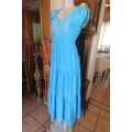 Beautiful light turquoise ankle length dress with cream embroidery on front size 32/8.