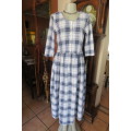 High quality dress by 'Paris Sport Club' size 32/8. Navy, light blue and white check pattern.