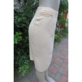 Elegant vanilla colour pencil skirt in crepe polyester fabric by `Speechless` size 32/8.As new