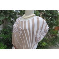 Cool sleeveless vintage dress in ecru and white diagonal stripes size 40/16.