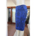 Bodycon skirt in royal blue with black baroque print in poly stretch.By`Insync Formal` size 34/10.