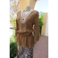 Fab light brown peplum style top in pattern creased 100% wash and wear polyester fabric.Size 36/12