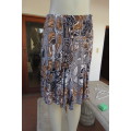 Cute but smart kneelength gored skirt in stretch polyester. By Audacity. Size 38/14. New condition