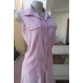 Cute pink and cream vertical striped sleeveless top in size 32/8 by INSYNC. Two dummy pockets.