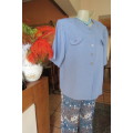 Smart Steel blue satin top/jacket with short sleeves.Round neckline and dummy pockets.Size 40/16