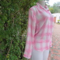 Soft and silky white and pink check long sleeve blouse in 100% polyester chiffon. Size 30/6 As new
